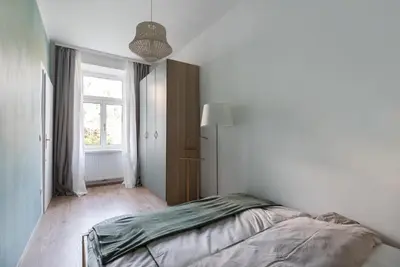Ein Bett oder Betten in einem Zimmer der Unterkunft Caring Family Apartment Close To The Center