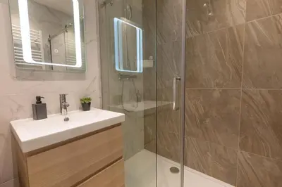 Ein Badezimmer in der Unterkunft Zeus Design Apartments Prater