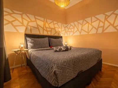 Ein Bett oder Betten in einem Zimmer der Unterkunft Exclusive Apartment Schönbrunn