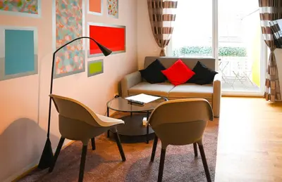 Ein Sitzbereich in der Unterkunft Modern Suite Schönbrunn