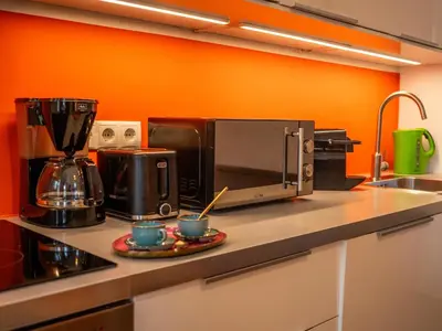 Küche/Küchenzeile in der Unterkunft Highlight Suite City Center