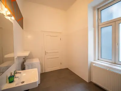 Ein Badezimmer in der Unterkunft Highlight Suite City Center