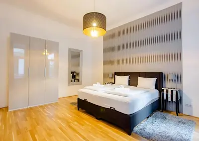 Ein Bett oder Betten in einem Zimmer der Unterkunft Exclusive Apartment City Center