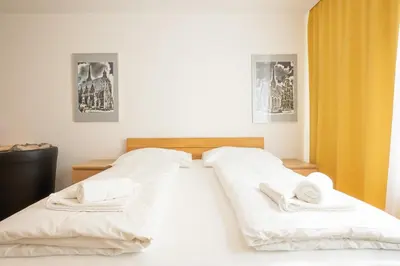 Ein Bett oder Betten in einem Zimmer der Unterkunft Central living - Stephansdom Apartments