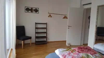 Ein Bett oder Betten in einem Zimmer der Unterkunft Moderne Maisonette mit Terrasse
