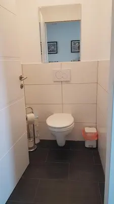 Ein Badezimmer in der Unterkunft Moderne Maisonette mit Terrasse
