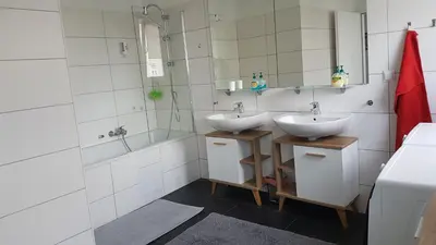 Ein Badezimmer in der Unterkunft Moderne Maisonette mit Terrasse