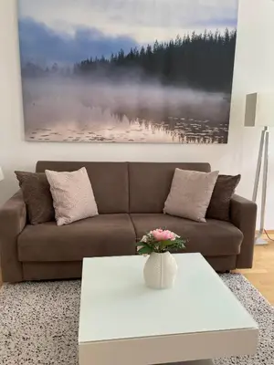 Ein Sitzbereich in der Unterkunft New cozy Apartment, Top location, 12 min to center