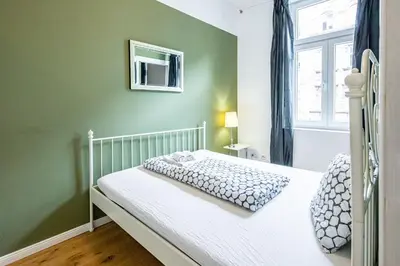 Ein Bett oder Betten in einem Zimmer der Unterkunft Viennese charm 2.0 by JR City Apartments
