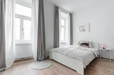 Ein Bett oder Betten in einem Zimmer der Unterkunft Nice apartment in lovely area