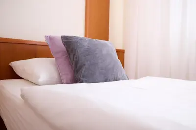 Ein Bett oder Betten in einem Zimmer der Unterkunft Tennis- und Freizeitzentrum Neudörfl