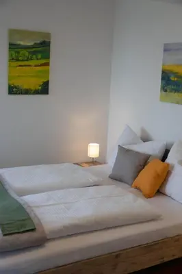 Ein Bett oder Betten in einem Zimmer der Unterkunft WeinApart im Winzerschlössl
