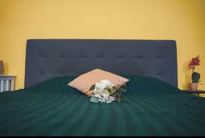 Ein Bett oder Betten in einem Zimmer der Unterkunft The Beautiful Italian Suit
