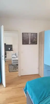 Ein Bett oder Betten in einem Zimmer der Unterkunft Exquisit Apartment Simmering