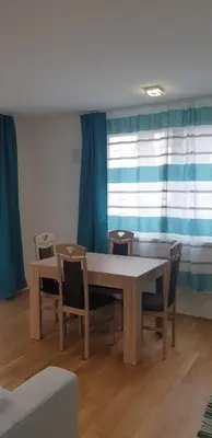 Ein Sitzbereich in der Unterkunft Exquisit Apartment Simmering