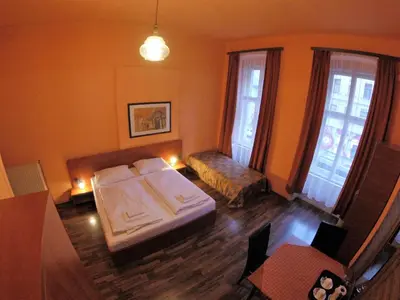 Ein Bett oder Betten in einem Zimmer der Unterkunft Pension Madara