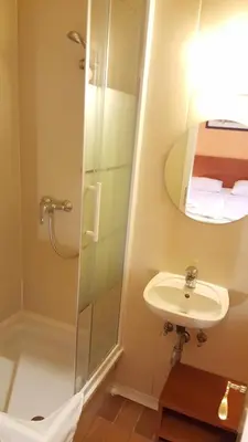 Ein Badezimmer in der Unterkunft Pension Madara