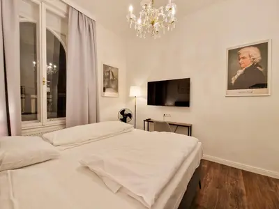 Ein Bett oder Betten in einem Zimmer der Unterkunft Pension Mozart - Newly Renovated