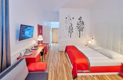 Ein Bett oder Betten in einem Zimmer der Unterkunft Hotel Zipser