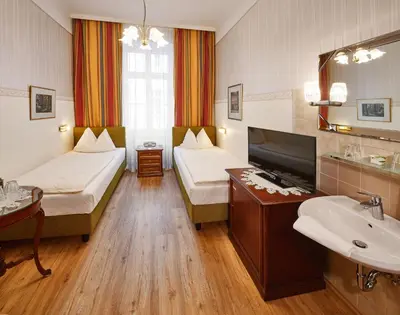 Ein Bett oder Betten in einem Zimmer der Unterkunft Hotel Austria - Wien