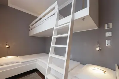 Ein Bett oder Betten in einem Zimmer der Unterkunft Der Wilhelmshof