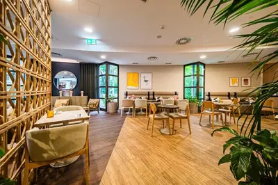 Ein Restaurant oder anderes Speiselokal in der Unterkunft voco Vienna Prater by IHG