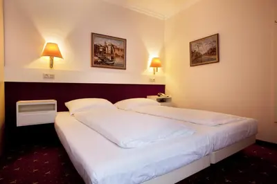 Ein Bett oder Betten in einem Zimmer der Unterkunft Pension Pharmador