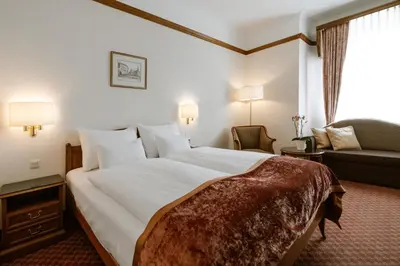 Ein Bett oder Betten in einem Zimmer der Unterkunft Hotel City Central