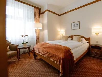 Ein Bett oder Betten in einem Zimmer der Unterkunft Hotel City Central