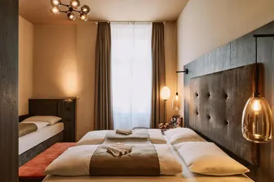 Ein Bett oder Betten in einem Zimmer der Unterkunft Urban Rooms Rathaus - Self Check-In