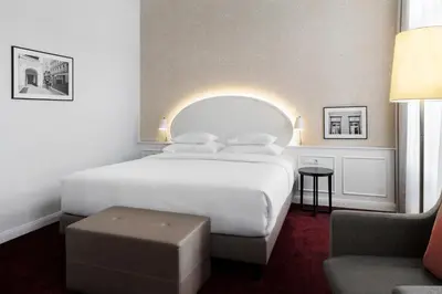Ein Bett oder Betten in einem Zimmer der Unterkunft Hotel Rathauspark Wien - Handwritten Collection