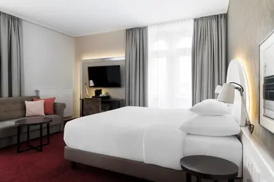 Ein Bett oder Betten in einem Zimmer der Unterkunft Hotel Rathauspark Wien - Handwritten Collection