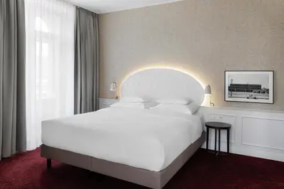 Ein Bett oder Betten in einem Zimmer der Unterkunft Hotel Rathauspark Wien - Handwritten Collection