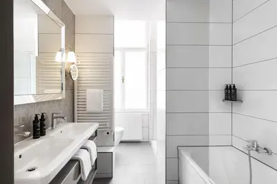 Ein Badezimmer in der Unterkunft Hotel Rathauspark Wien - Handwritten Collection