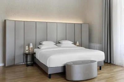Ein Bett oder Betten in einem Zimmer der Unterkunft Hotel Rathauspark Wien - Handwritten Collection