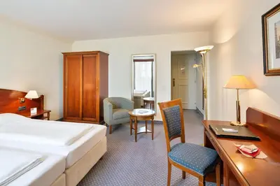 Ein Bett oder Betten in einem Zimmer der Unterkunft Austria Trend Hotel Schloss Wilhelminenberg Wien