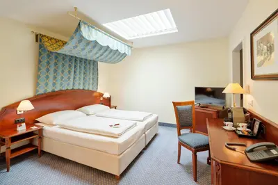 Ein Bett oder Betten in einem Zimmer der Unterkunft Austria Trend Hotel Schloss Wilhelminenberg Wien