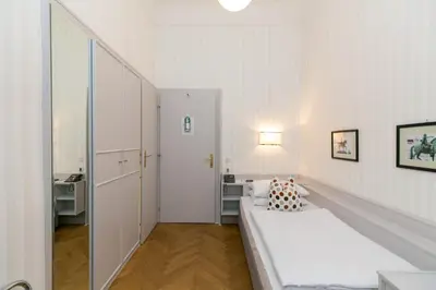 Ein Bett oder Betten in einem Zimmer der Unterkunft Hotel Kärntnerhof