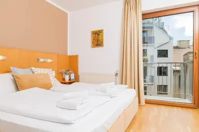 Ein Bett oder Betten in einem Zimmer der Unterkunft Art Hotel Vienna