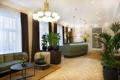 Ein Sitzbereich in der Unterkunft Drei Kronen Hotel Wien City