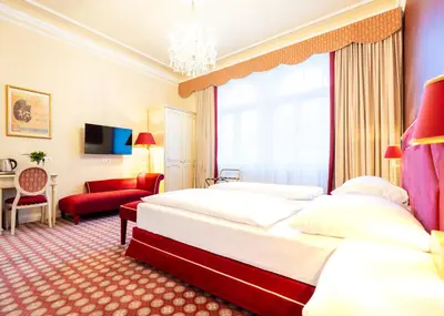 Ein Bett oder Betten in einem Zimmer der Unterkunft Aviano Boutique Hotel