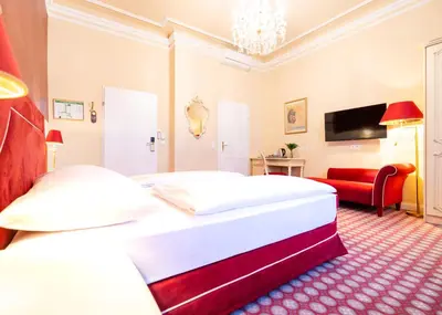Ein Bett oder Betten in einem Zimmer der Unterkunft Aviano Boutique Hotel