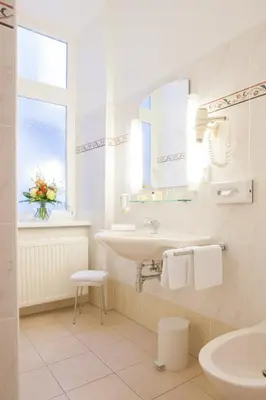 Ein Badezimmer in der Unterkunft Hotel Kaiserin Elisabeth