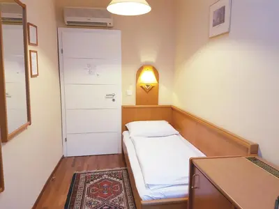 Ein Bett oder Betten in einem Zimmer der Unterkunft Hotel Haydn