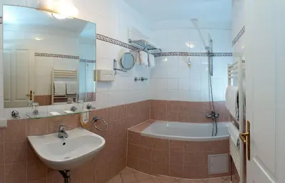 Ein Badezimmer in der Unterkunft Suite Hotel 900 m zur Oper