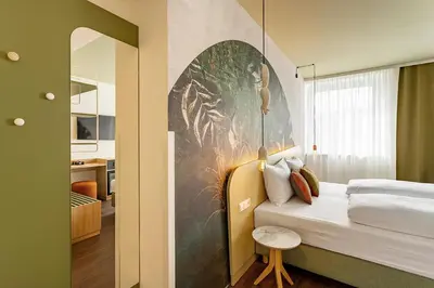 Ein Bett oder Betten in einem Zimmer der Unterkunft The Weekend Hotel