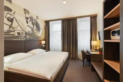 Ein Bett oder Betten in einem Zimmer der Unterkunft Hotel Lucia