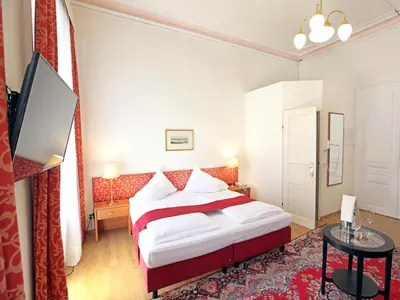 Ein Bett oder Betten in einem Zimmer der Unterkunft HPA Hotel Andreas