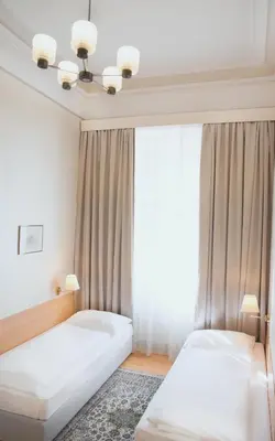 Ein Bett oder Betten in einem Zimmer der Unterkunft HPA Hotel Andreas
