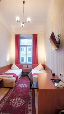 Ein Bett oder Betten in einem Zimmer der Unterkunft HPA Hotel Andreas